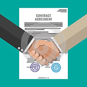 Contract agreement paper and handshake