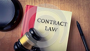 Contract law and gavel on a table. Law and legal concept