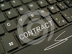 Contract message on computer keyboard photo