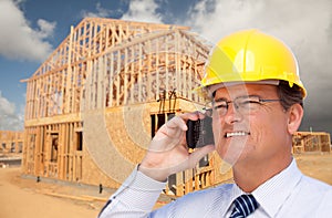 Contractor in Hardhat at Construction Site