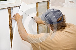 Contractor Installing Insulation