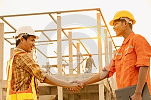 The contractor and the supervisor shook hands after inspecting the site
