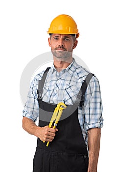 Contractor worker holding adjustable spanner