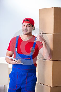 The contractor worker moving boxes during office move