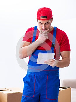 Contractor worker moving boxes during office move