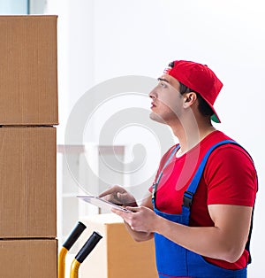 Contractor worker moving boxes during office move