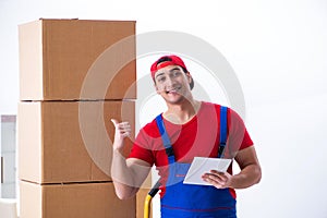 The contractor worker moving boxes during office move