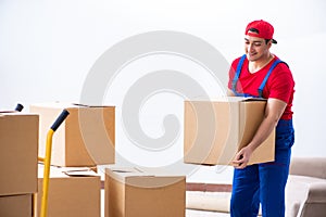 The contractor worker moving boxes during office move