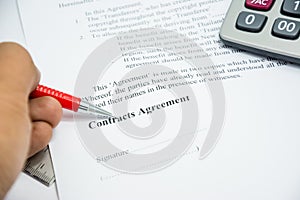 Contracts agreement sign on document paper