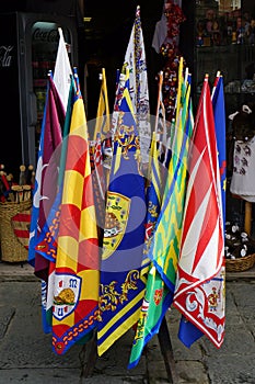 Contrada flags on square Campo in Siena, Italy