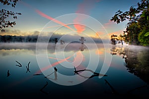 Contrail Colors and Reflection - Cross in the sky