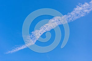 Contrails, vapour trails from the airplane with blue sky background