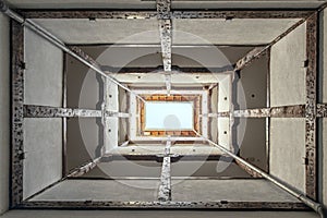 Contrapicado image of stairwell of an old building with rehabilitated