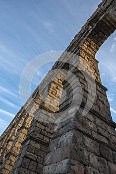 Contrapicado image of stone arches of the Roman aqueduct of Segovia photo