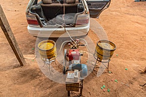 Contraption for refueling gas tanks in non petrol/gasoline taxis in Yamoussoukro Ivory Coast