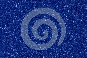 Contrast blue glitter background for elegant decorations, new texture in stylish tone.