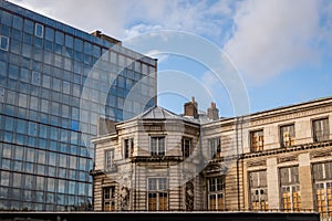 Contrast of a historic building and modern architecture: HÃ´tel d`Avelin, Lille, France