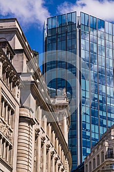 Contrast of old and new buildings in London`s financial district
