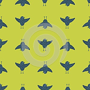 Contrast seamless pattern with flying birds navy blue silhouettes. Green background