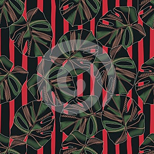 Contrast seamless pattern with green dark tones monstera leafs. Red and black striped background. Botanical print