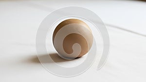 Contrasting background capturing its rounded shape and smooth