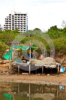 Contrasting housing at Khao Takiab in Thailand