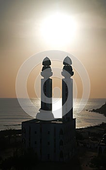 Contre-jour view to Mosque of the Divinity at sunset, Dakar, Senegal