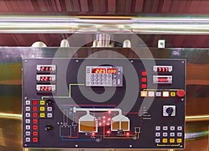 Control board of microbrewery with digits and beer