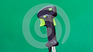 Control handle on a green background.