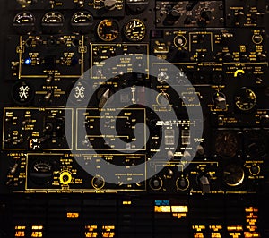 Control levers and switches with backlighting. Airplane cockpit