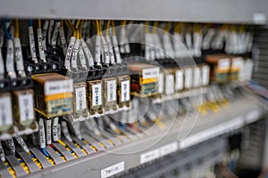 Control panel with circuit breakers, fuses, rails, wiring in the distribution board. Power electric in electrical cabinet control