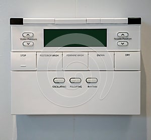 Control Panel of the toilet bowl. Hygienic and high technology of the toilet bowl, automatic modern flush toilet