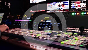 Control panel of TV Studio. Stock footage. Many different luminous buttons on TV equipment in recording Studio