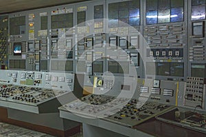 Control room in a nuclear power plant with a variety of electronic devices and a control board