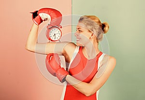 Control time. Punctuality and personal efficiency. Time management skills. Battle for self discipline. Woman holding