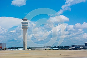 Control Tower at the Airport on Partially Cloudy Sky