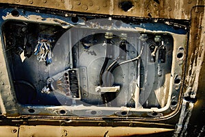 Control units made of aluminum alloy in cockpit of crashed aircraft