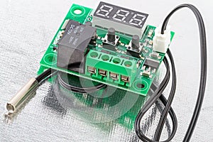 Controller with a temperature sensor
