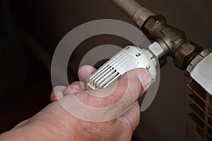 Controlling central heating temperature by adjusting thermostatic radiator valve