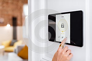 Controlling home alarm system with a digital touch screen panel