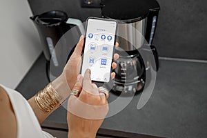 Controlling smart devices with phone on the kitchen