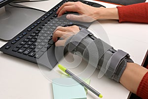 Contused Woman Hand In Stabilizer Working