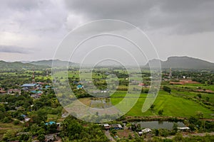 Conutryside with hill, house, land, river and cloud