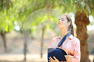 Convalescent woman breathing fresh air photo