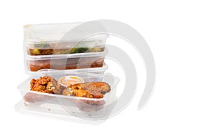 Convenient but unhealthy disposable plastic lunch boxes with meals