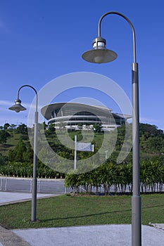 Convention Center on hill and two lamp posts