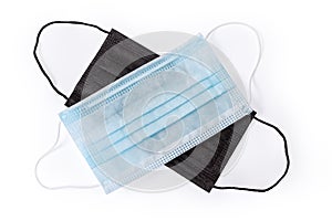 Conventional light blue disposable medical mask and similar black mask