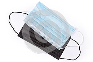 Conventional light blue disposable medical mask and similar black mask