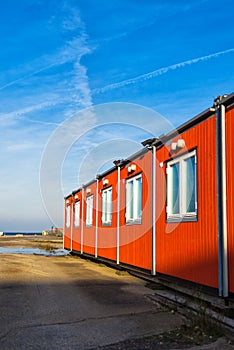 Conventional shipping containers housing