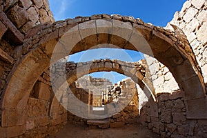 Converging ancient stone arches